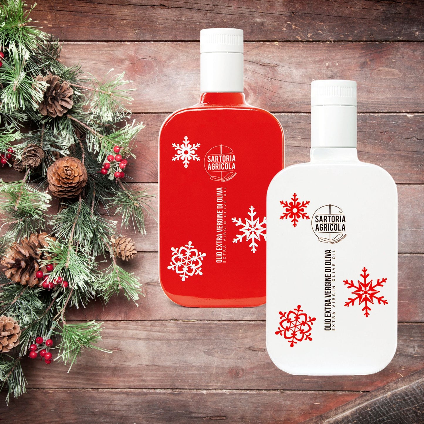 Red and white bottle of extra virgin olive oil, Christmas limited edition crafted in Puglia, with white snowflake design on rustic wood background.